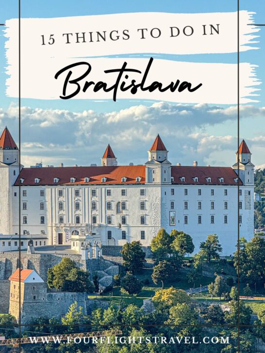 Bratislava castle with red rooftops, surrounded by trees, under blue sky; travel guide text overlay.